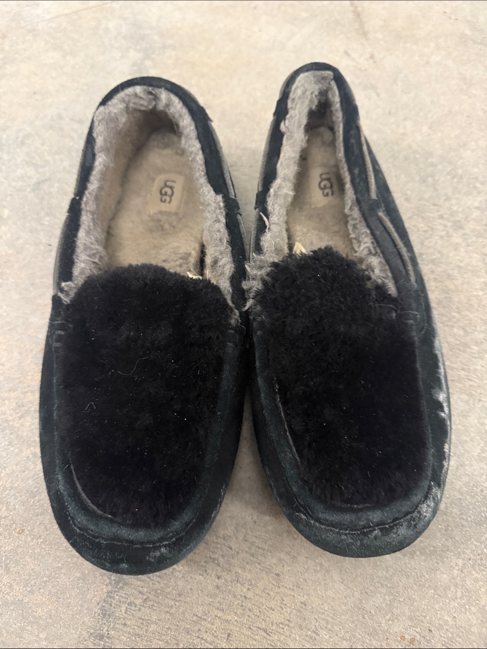 UGG Black Suede Shearling Pom Moccasin Slippers